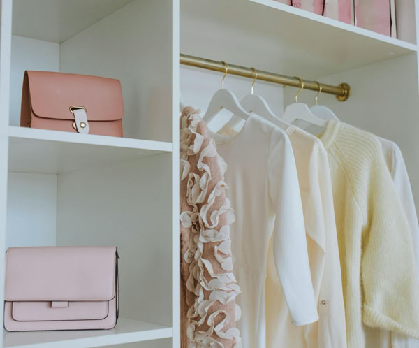 A White Wooden Closet of a Woman