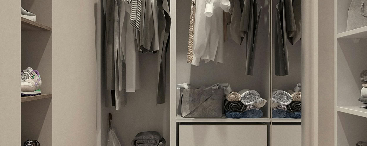 Assorted Clothes Hanged Inside Cabinet
